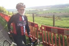 Geoffrey biking in Scotland